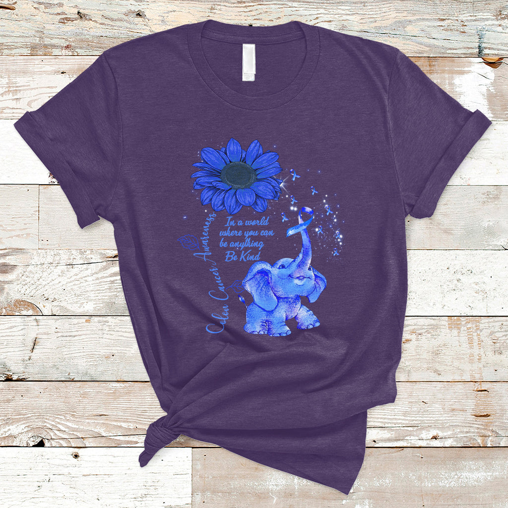 Purple T-shirt with blue elephant graphic, sunflower, and ribbon awareness design