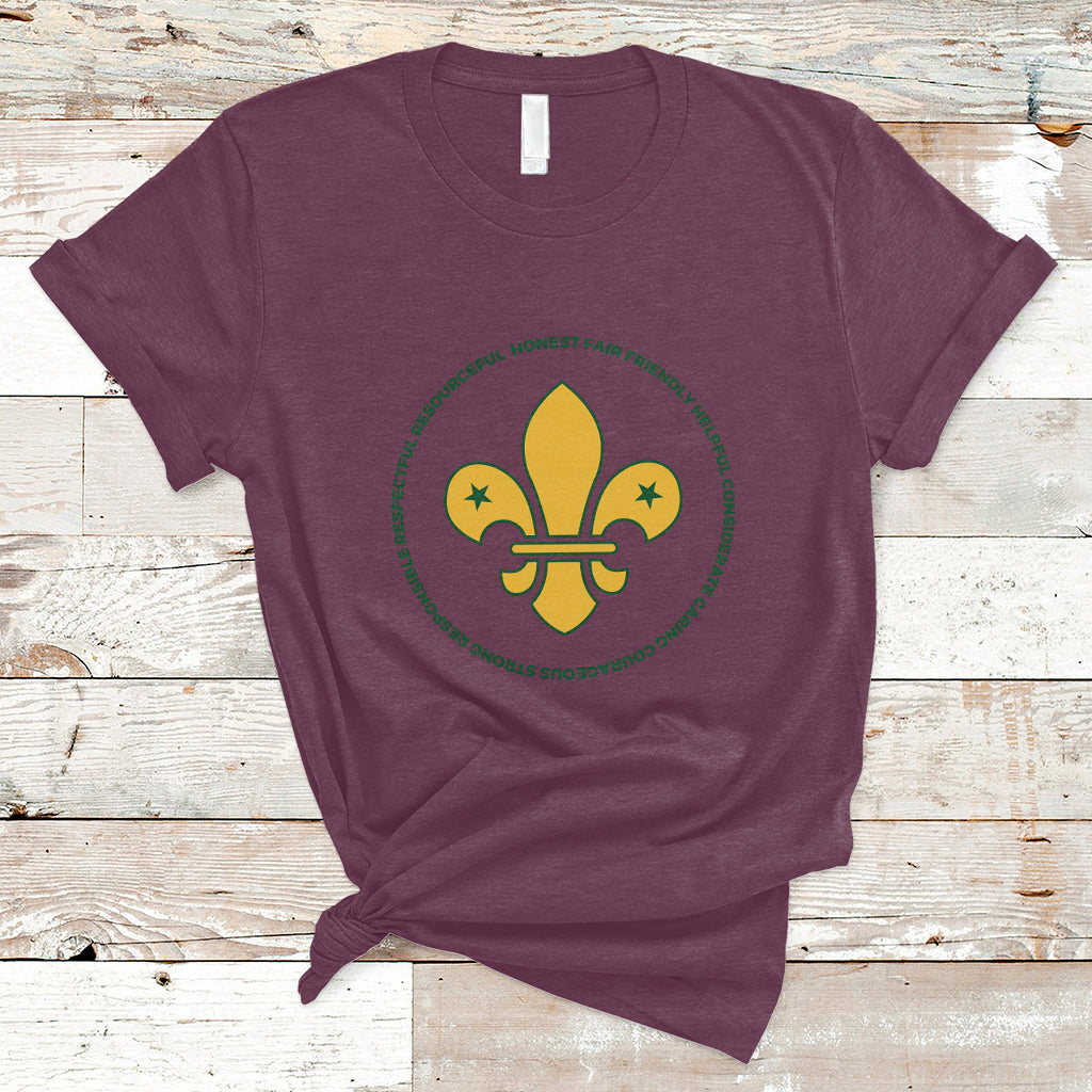 Girls graphic T-shirt, maroon, yellow fleur-de-lis emblem with green ring and icons