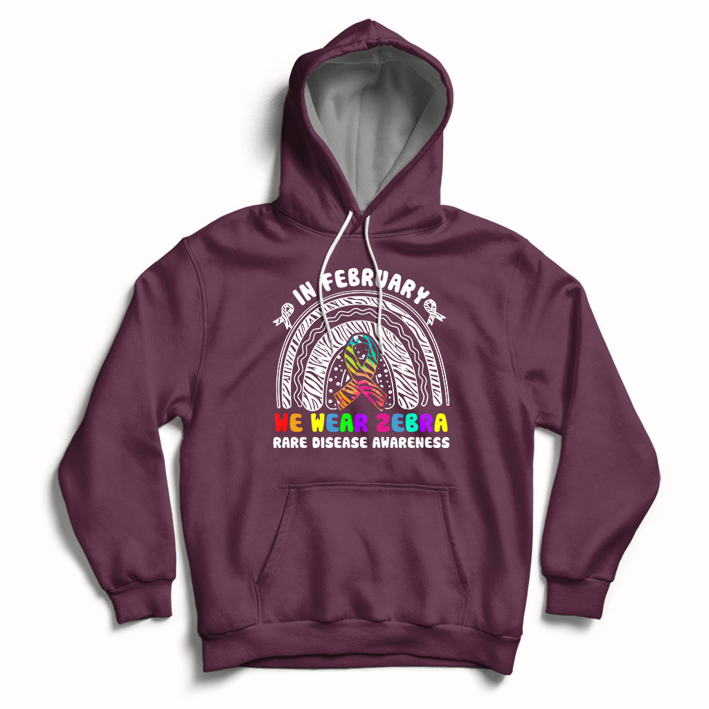 Maroon zebra-themed rainbow awareness hoodie with front graphic and drawstring hood