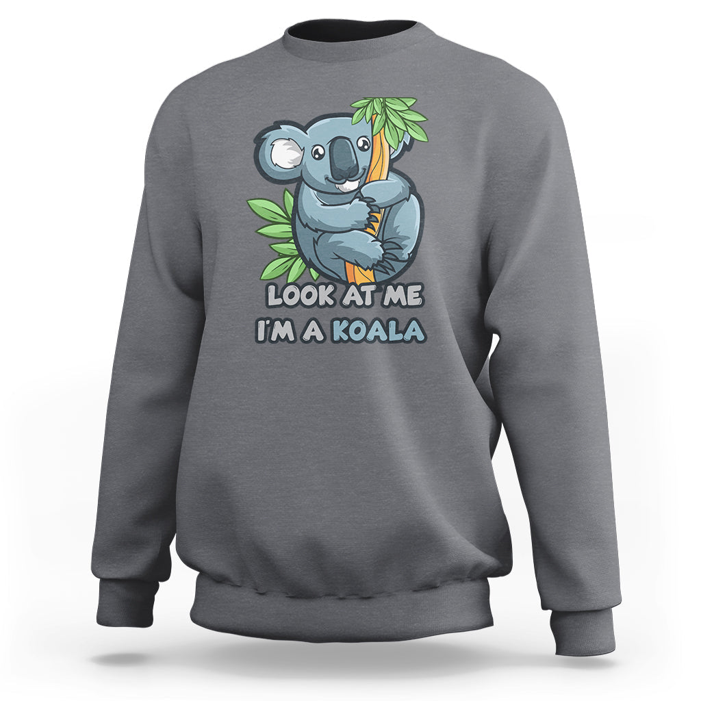 Light gray crewneck sweatshirt with koala graphic and 'LOOK AT ME I'M A KOALA' text