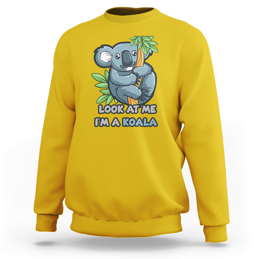 Daisy yellow crewneck sweatshirt with koala graphic and 'LOOK AT ME I'M A KOALA' text