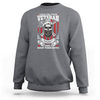 Charcoal gray crewneck sweatshirt with Veteran graphic, grumpy skull and flags on chest.