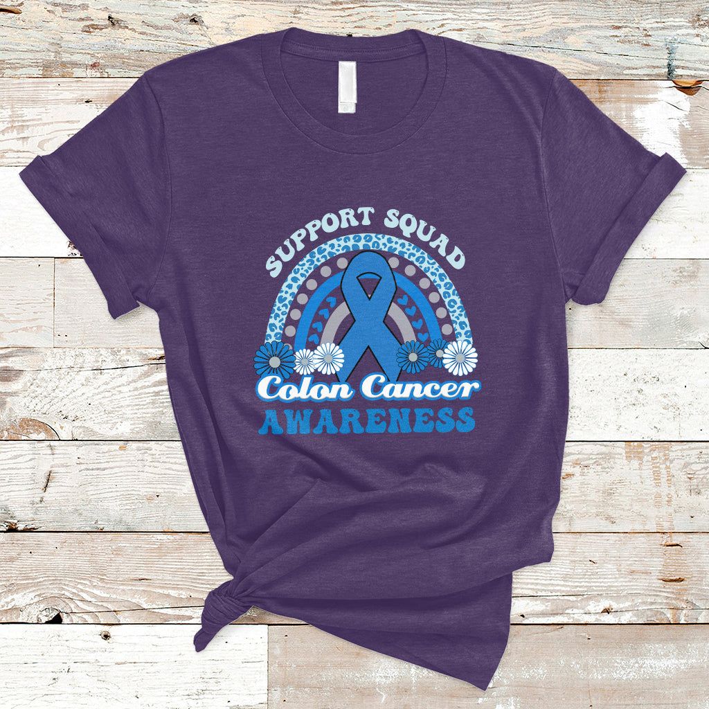 Purple t-shirt with Support Squad Colon Cancer Awareness text and blue awareness ribbon graphic.