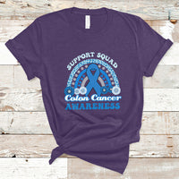 Purple t-shirt with Support Squad Colon Cancer Awareness text and blue awareness ribbon graphic.