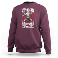 Maroon crewneck sweatshirt with Veteran graphic, grumpy skull and flags on chest.