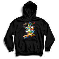 Black speed cubing hoodie with colorful cube graphic on the chest and front pocket.