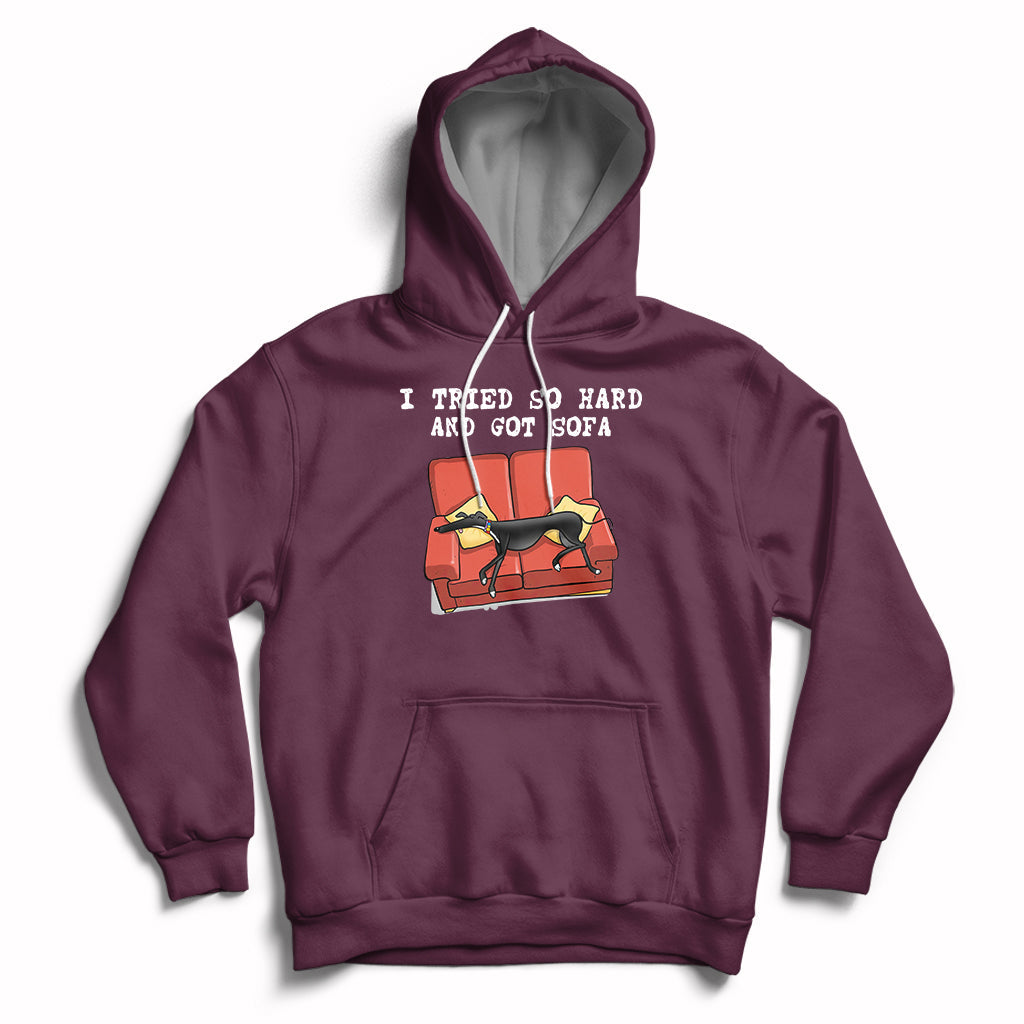 Maroon hoodie with front pocket, hood drawstrings, and dog on sofa graphic