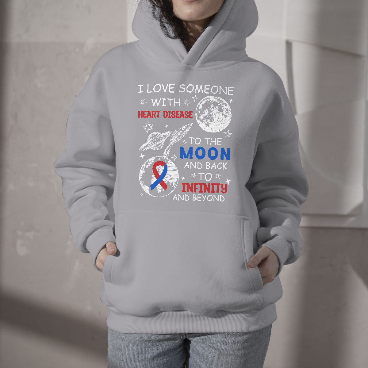 Light gray pullover hoodie with heart disease moon and infinity graphic