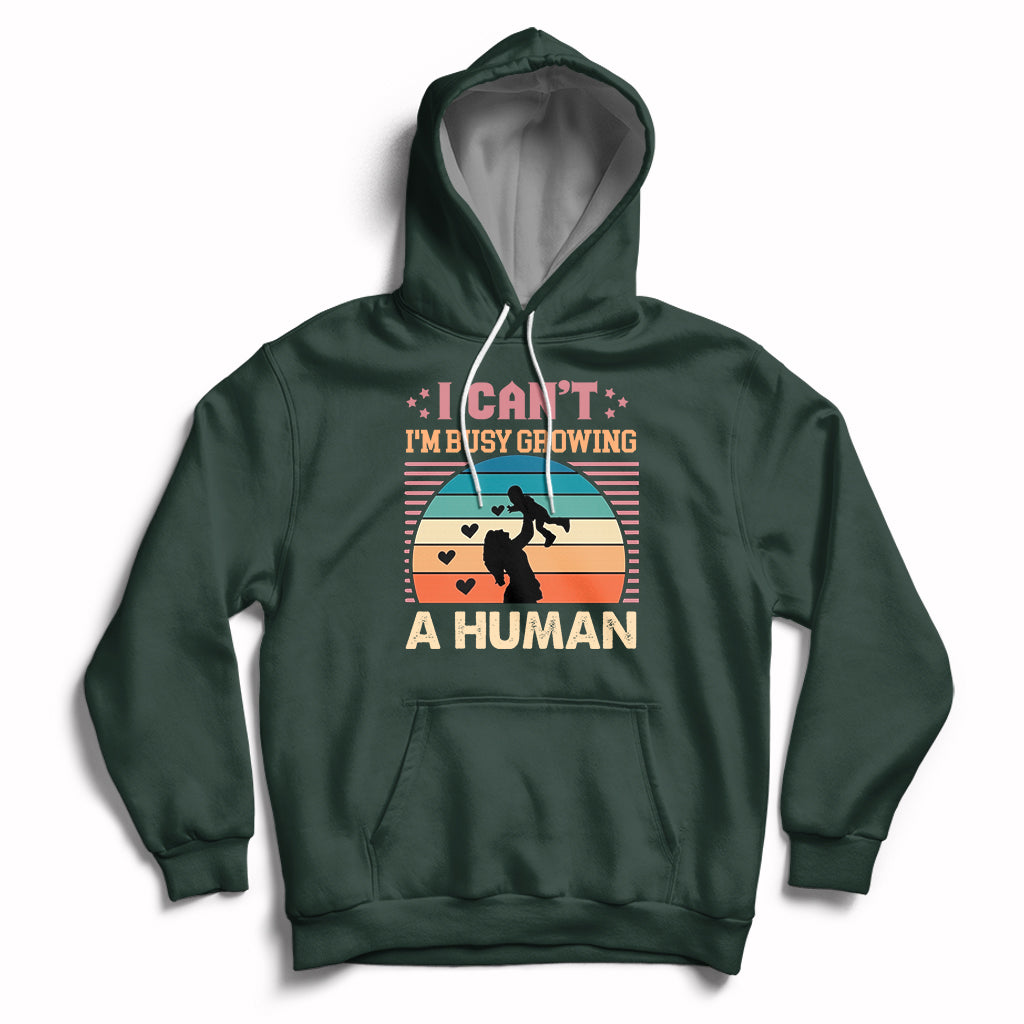 Forest green maternity pullover hoodie with kangaroo pocket and drawstring hood; busy human graphic
