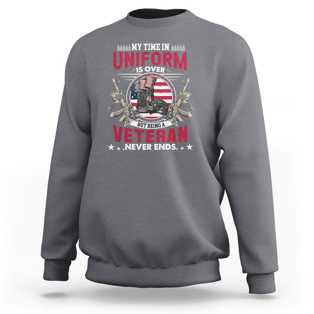 Light gray veteran graphic sweatshirt with 'Uniform is Over' and 'Veteran Never Ends' print