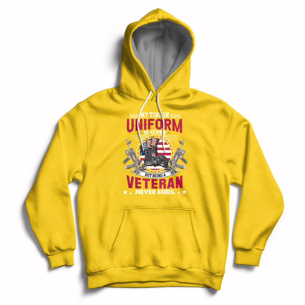 Gold pullover hoodie with veteran graphic on the chest