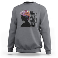 Women’s sweatshirt (back) light gray with floral silhouette and stacked “Not fragile” text
