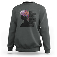 Women’s sweatshirt (back) dark gray with floral silhouette and stacked “Not fragile” text