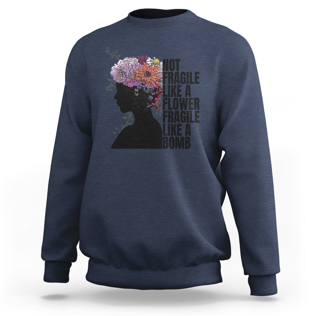 Women’s sweatshirt (back) slate blue with floral silhouette and stacked “Not fragile” text