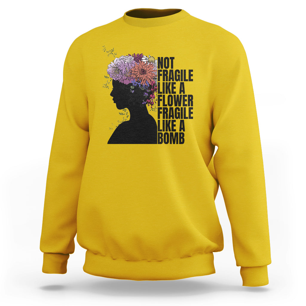 Women’s sweatshirt (back) yellow with floral silhouette and stacked “Not fragile” text