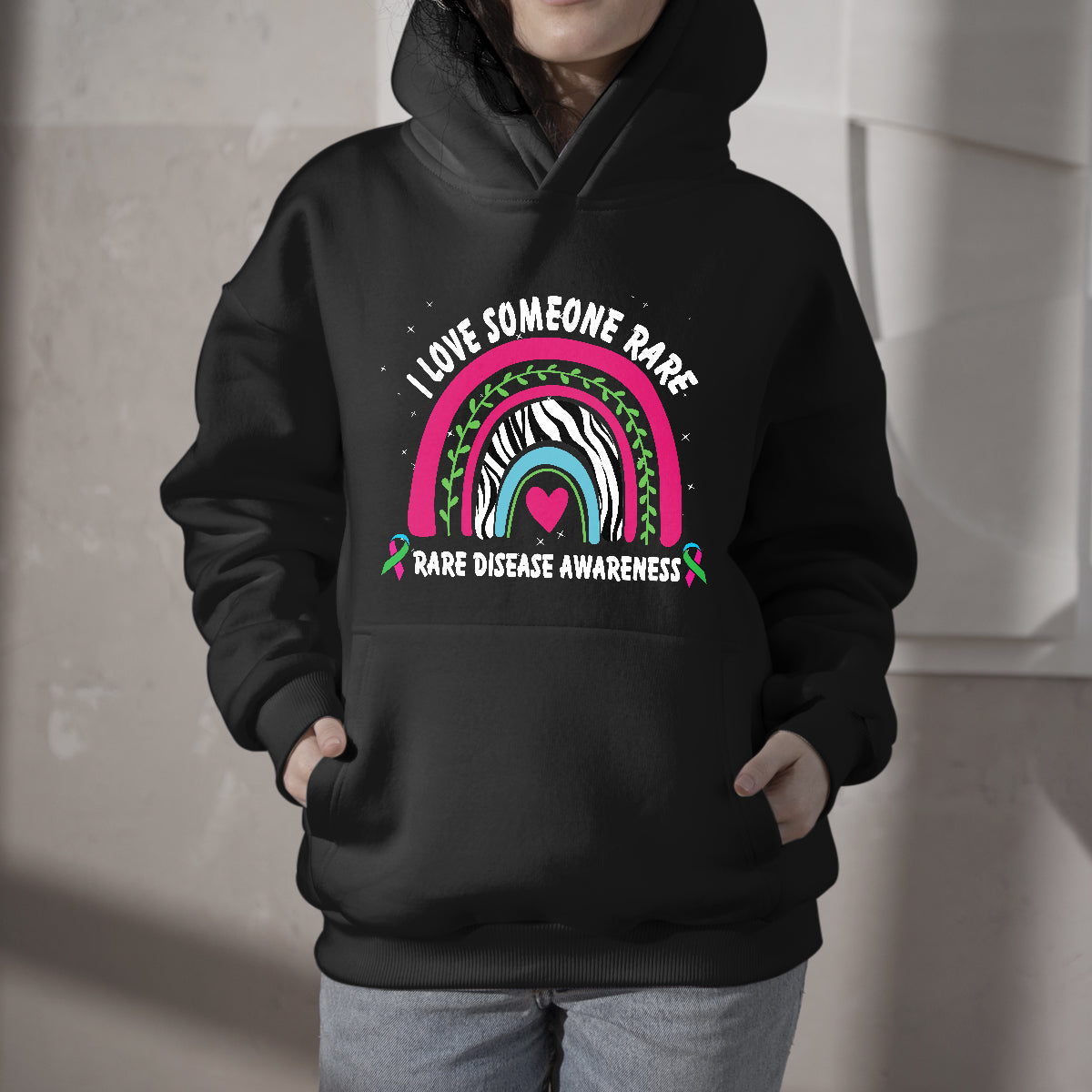 Black kids awareness hoodie, front rainbow zebra ribbon graphic and hood