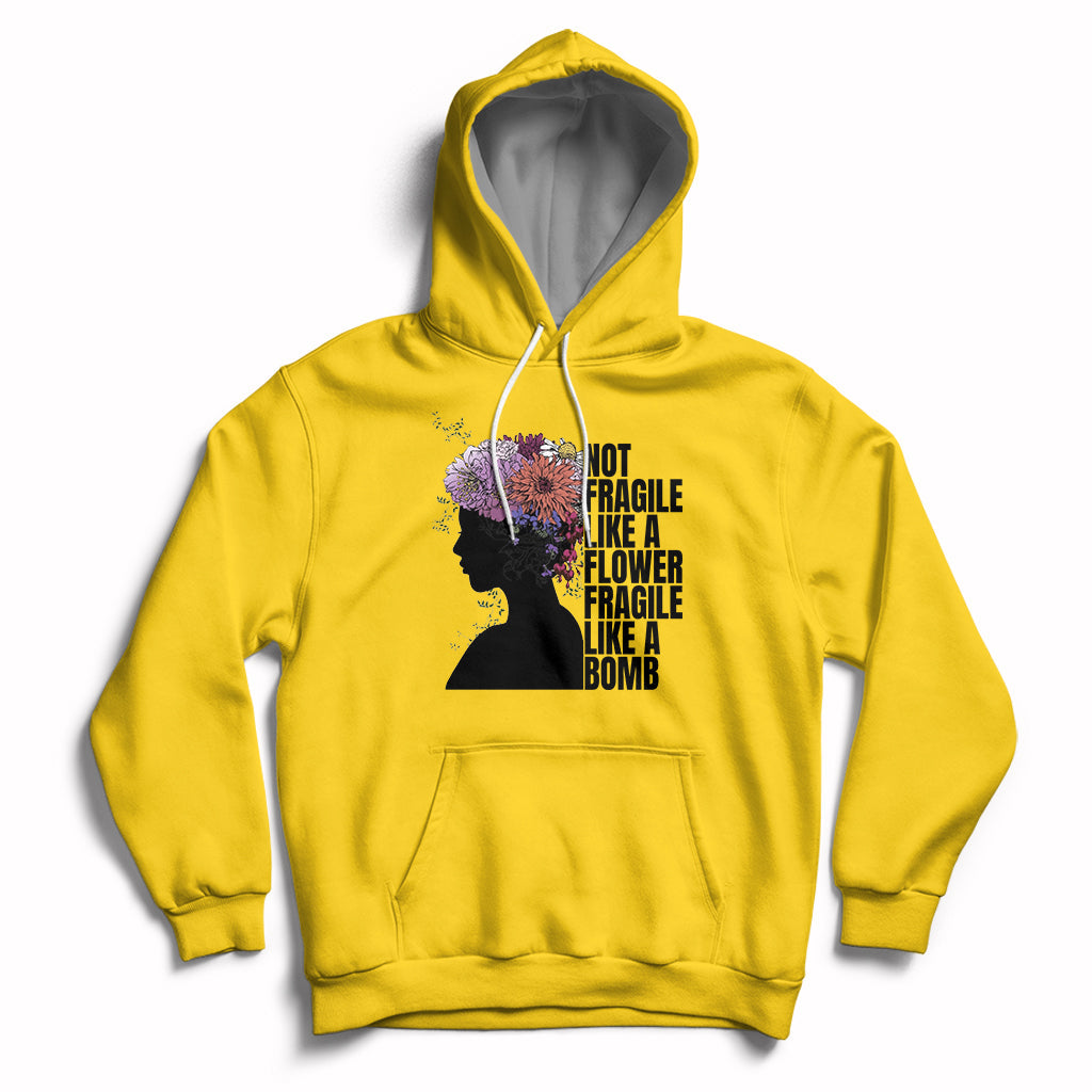 Women's daisy yellow pullover hoodie with front pocket and floral silhouette graphic.