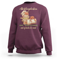 Funny Book Nerd Abibliophobia Definition The Fear Of Running Out Of Books Library Book Reading Sweatshirt - Wonder Print Shop