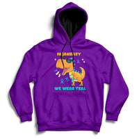 Purple hoodie with kangaroo pocket, hood, and chest “IN JANUARY” “WE WEAR TEAL” graphic