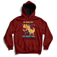 Maroon hoodie with kangaroo pocket, hood, and chest “IN JANUARY” “WE WEAR TEAL” graphic