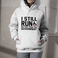 White pullover hoodie with 'I STILL RUN' graphic and GOVERNMENT text