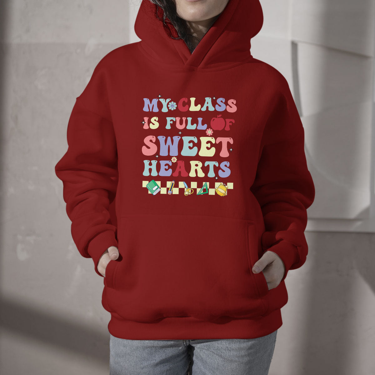 Red teacher hoodie with colorful 'Sweet Hearts' chest graphic, pullover hood & pocket