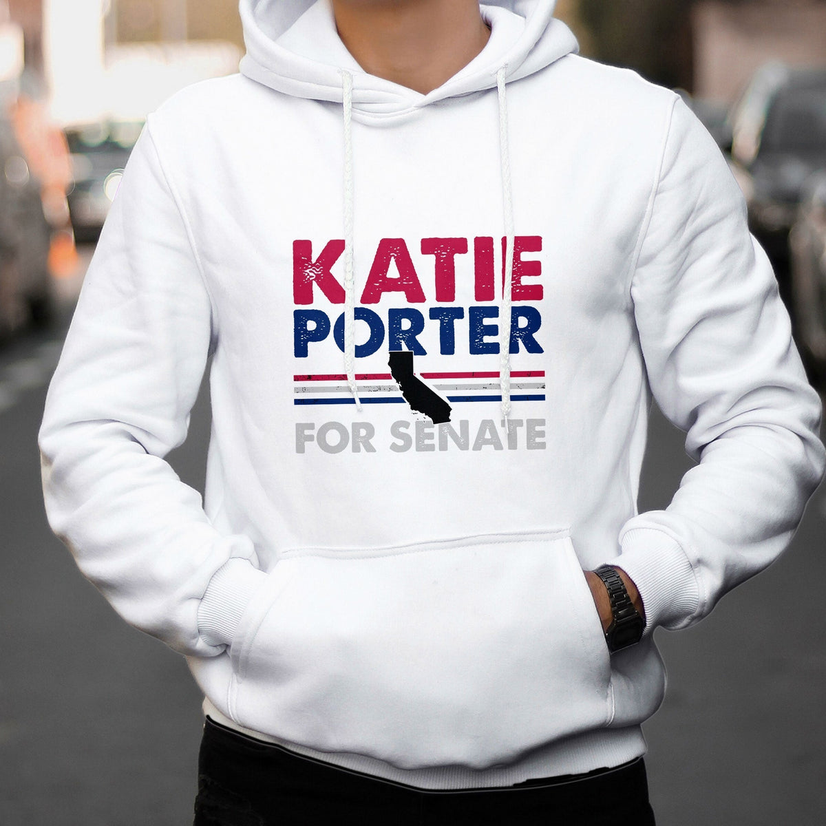 White hoodie with hood, front pouch, and "KATIE PORTER FOR SENATE" graphic