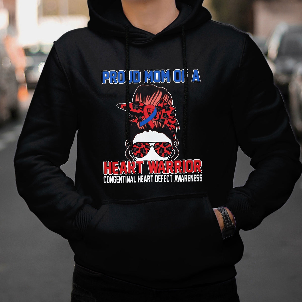 Black hoodie with “Heart Warrior” heart-defect awareness graphic on the chest