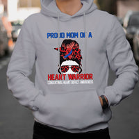 Light gray hoodie with “Heart Warrior” heart-defect awareness graphic on the chest