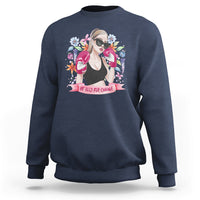 Women’s navy graphic sweatshirt with illustrated girl portrait and floral “Be Bold for Change”