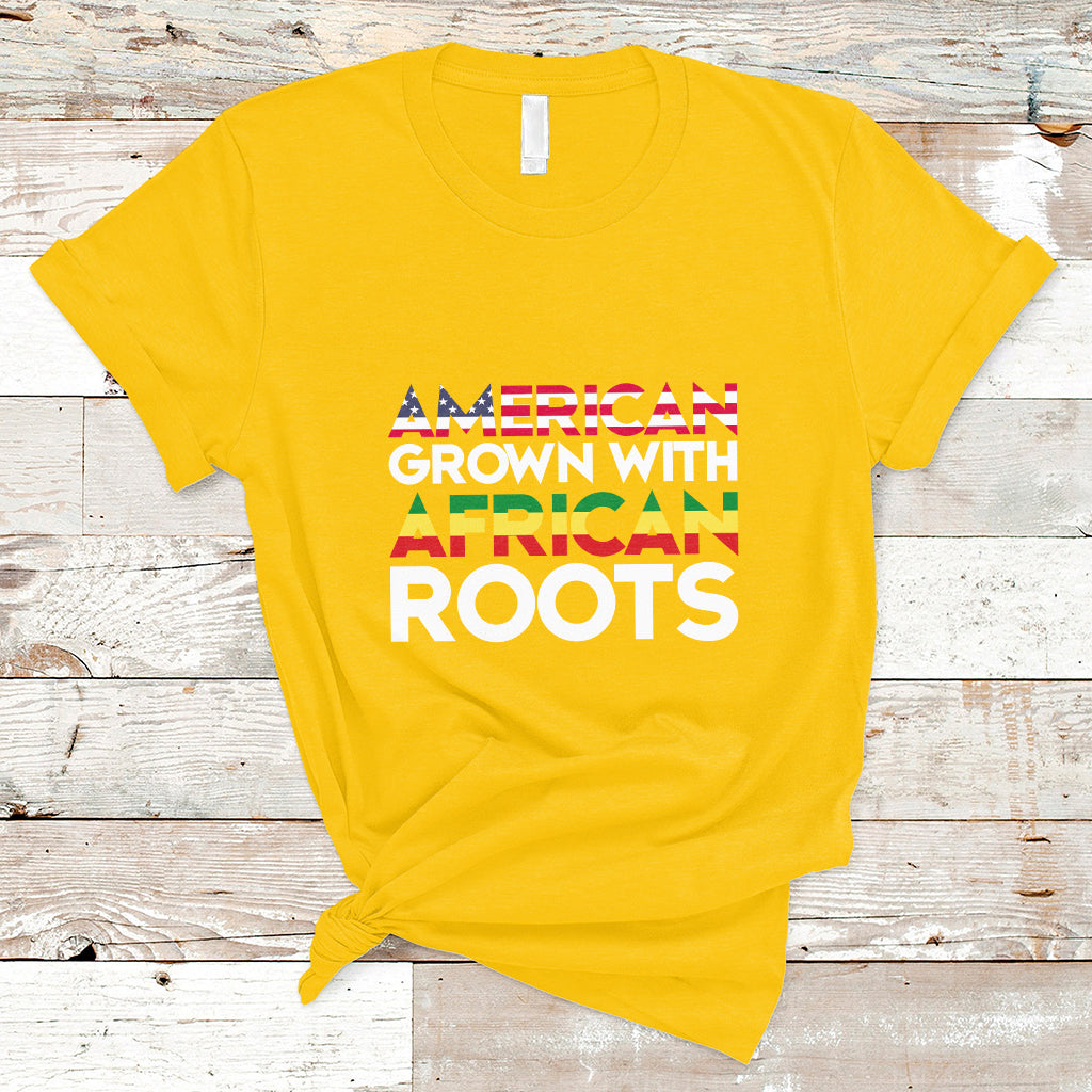 Daisy yellow crew-neck T-shirt with “AMERICAN GROWN WITH AFRICAN ROOTS” front print