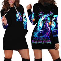 Pair of black hoodie dresses showing blue-purple witch skull print, one front and one back