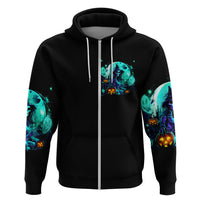Black zip hoodie with teal witch skull graphic on the chest and bright sleeve prints