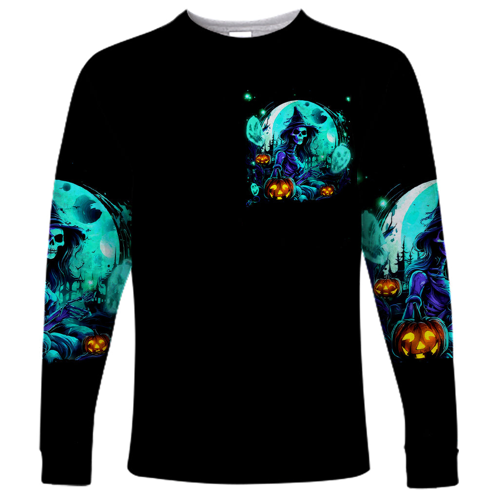 Unisex black long sleeve shirt with small blue-green witch Halloween graphic on chest