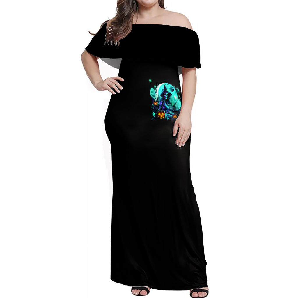 Black off-shoulder maxi dress with turquoise witch skull front print and long hem