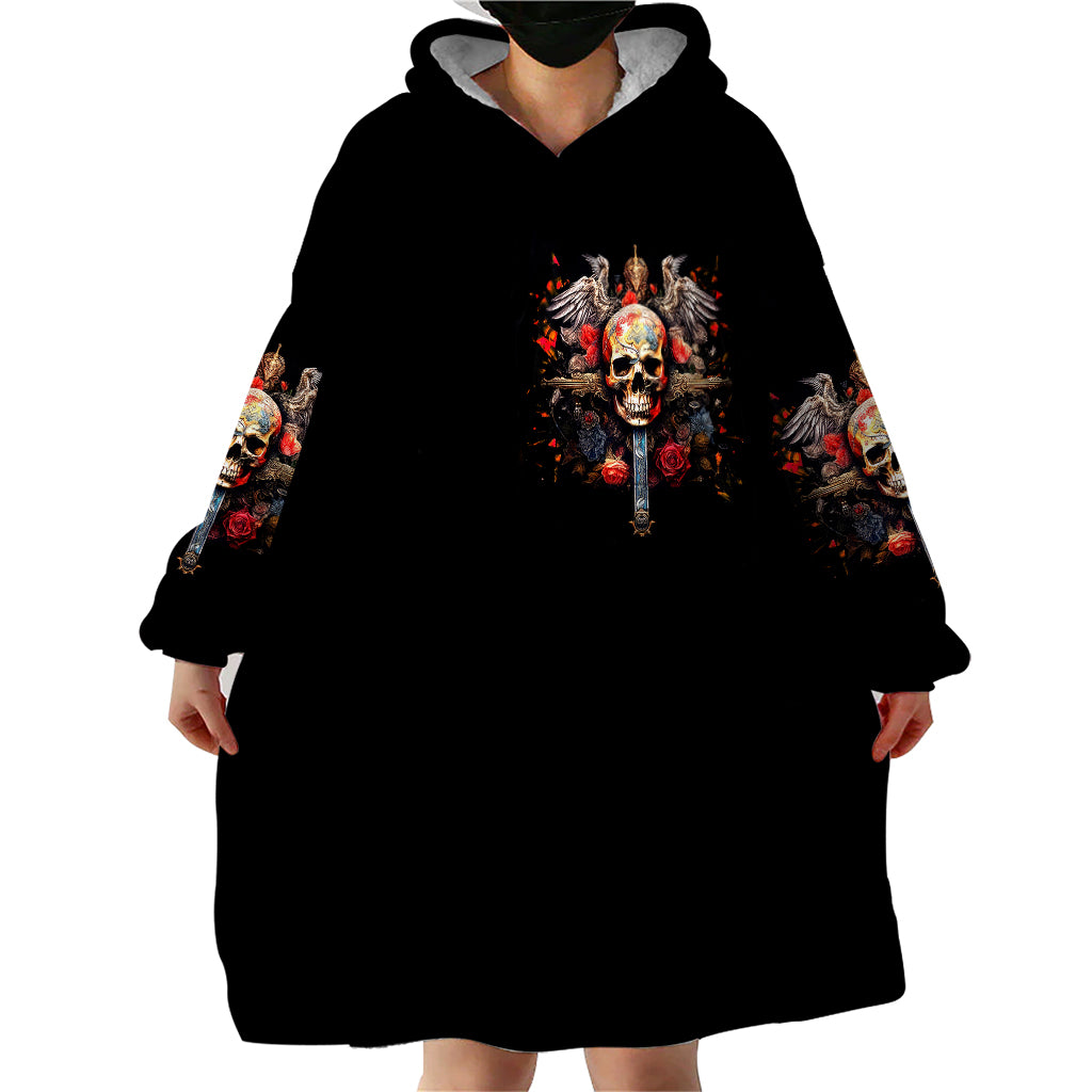 Black wearable blanket hoodie, front skull graphic with hood and full-length blanket body