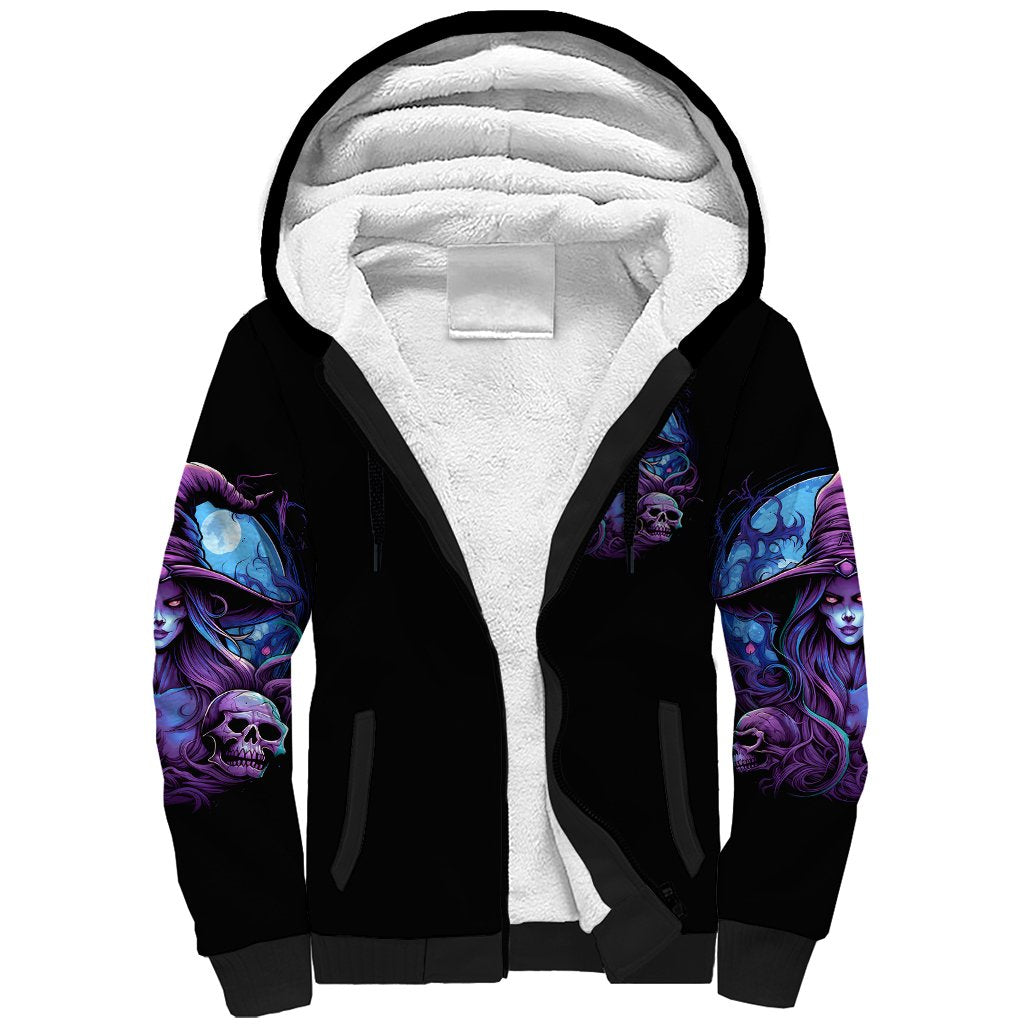 Black sherpa hoodie with white sherpa-lined hood and purple witch skull sleeves