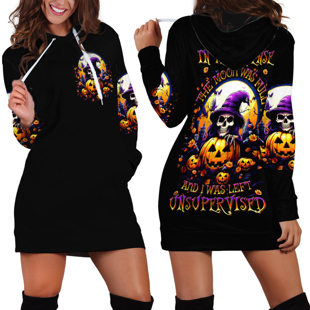 Black hoodie dress shown front and back, with pumpkin skull graphic and hood