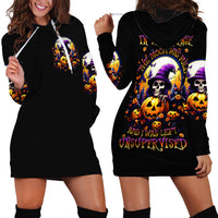 Black hoodie dress shown front and back, with pumpkin skull graphic and hood