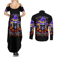 Black Halloween maxi dress with skull witch graphic; long-sleeve button shirt, back view