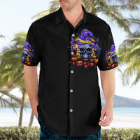 Black short-sleeve button-up Hawaiian shirt with purple witch-hat skull chest graphic.