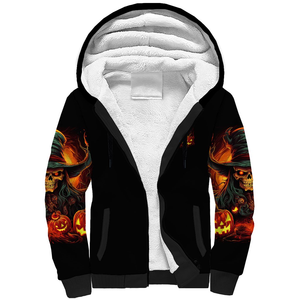 Black sherpa hoodie with open hood showing white fleece lining and flame skull sleeves