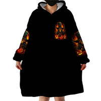 Black wearable blanket hoodie with hood, witch skull chest print and kangaroo pocket