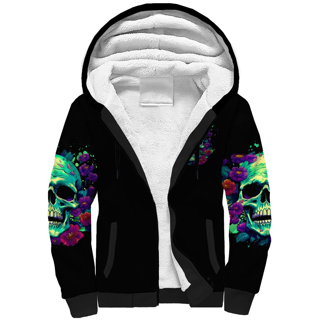 Black sherpa hoodie with white fleece-lined hood and colorful skull-flower sleeves