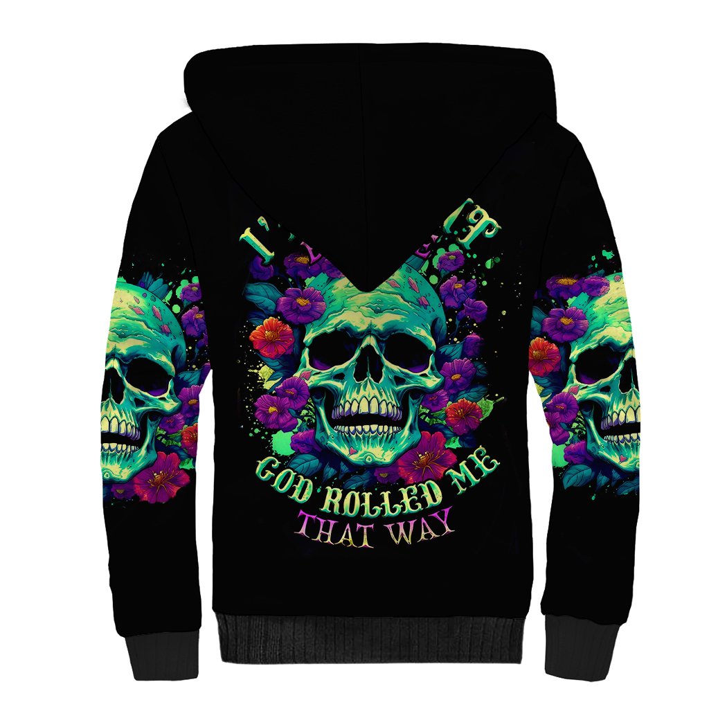 Black sherpa hoodie with large colorful skull and flower graphic on back