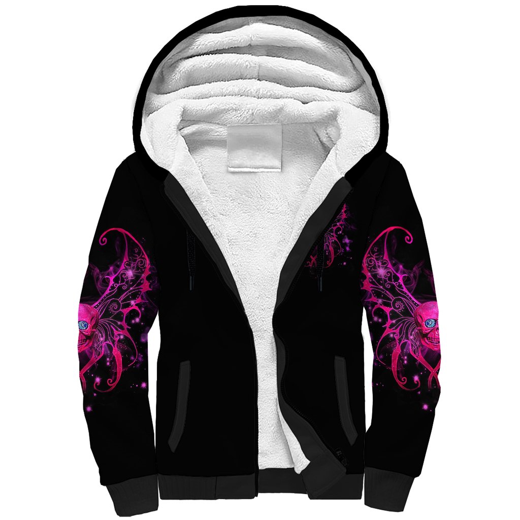 Black sherpa hoodie with white fleece-lined hood and purple sleeve artwork