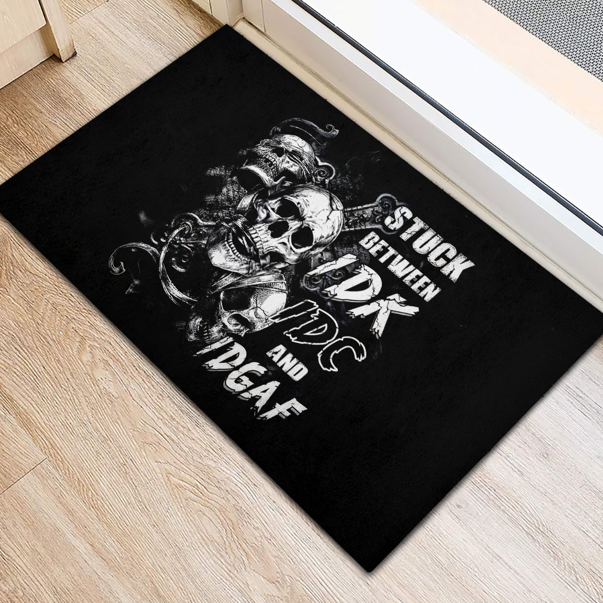 Three Skull Rubber Doormat Stuck Between Idk Idc And Idgaf - Wonder Print Shop