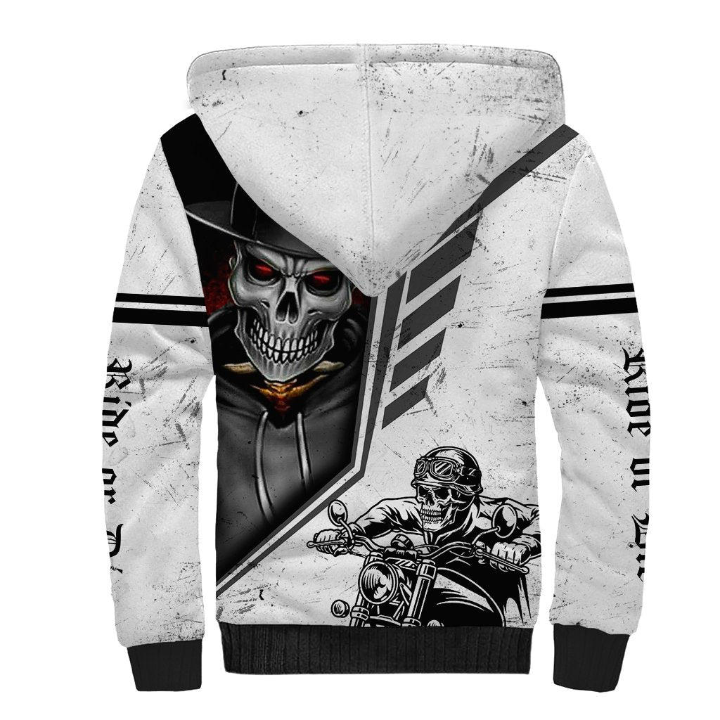 White sherpa hoodie with skull-and-rider print, black stripe details, and hood
