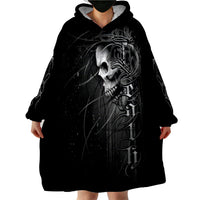 Black skull wearable blanket hoodie with hood and oversized skull print, front close-up