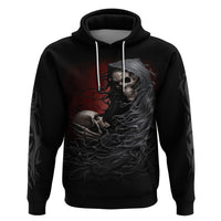 Black pullover hoodie with hood strings and skull graphic on front